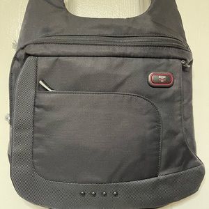 Tumi crossbody tech bag